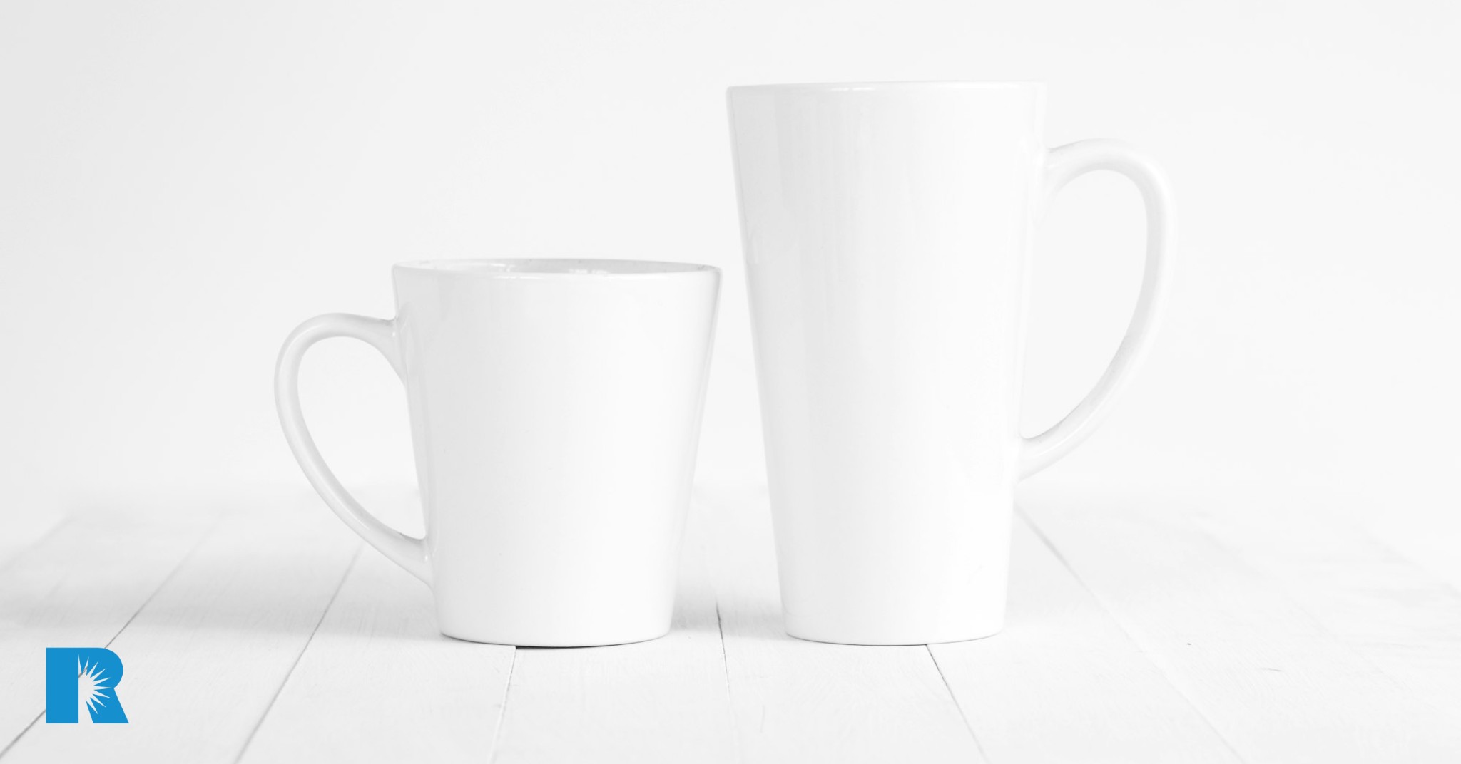 A photo illustration of two coffee cups, illustrating a comparison between the two.